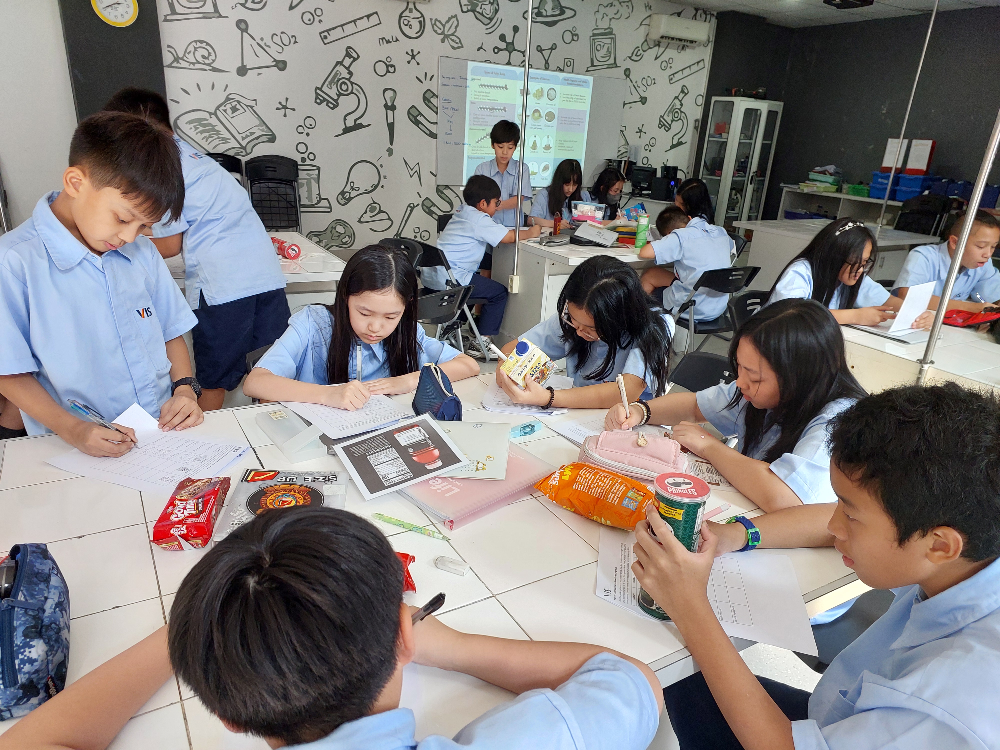 A student presenting to classmates